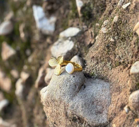 Ingrid – Gold Two-Sided Ring with White Natural Stone and Floral Design