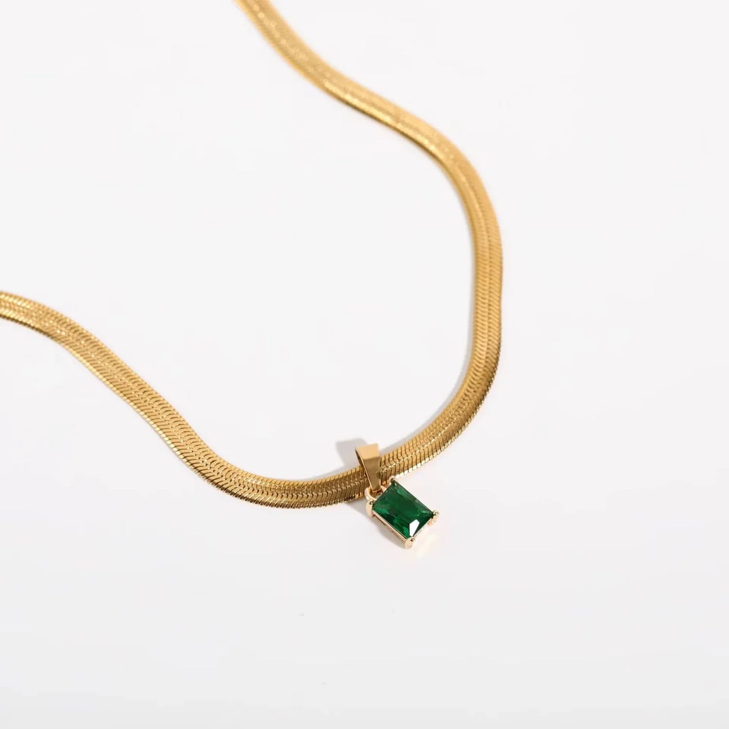 Amara – Gold Snake Necklace with Emerald Pendant