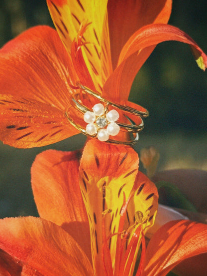 Waterproof 18K gold-plated stainless steel floral ring with pearl flower on three golden bands, women’s jewelry Lebanon